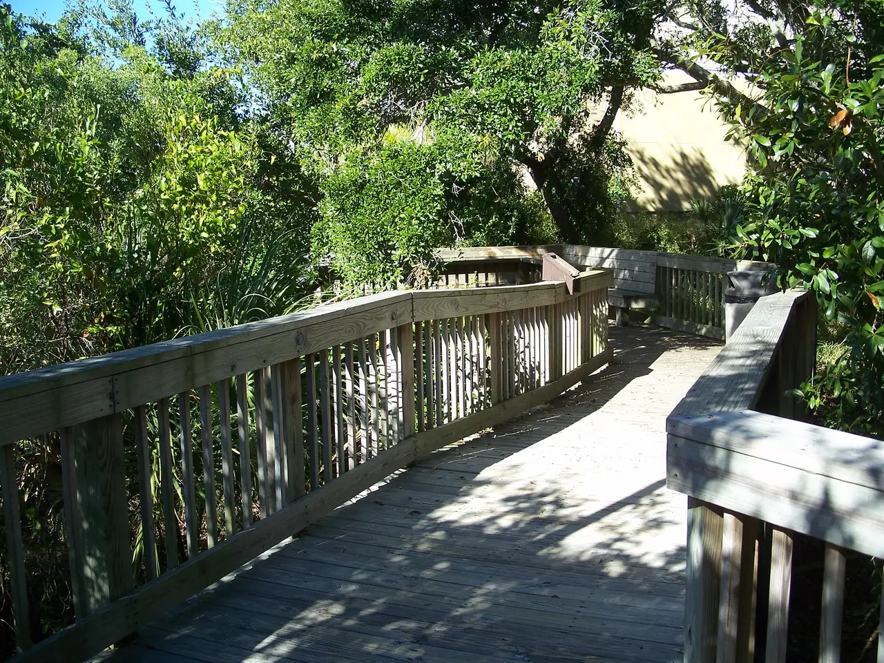 The shaded boardwalk at Oaks by the Bay Park in Panama City's St. Andrews neighborhood.