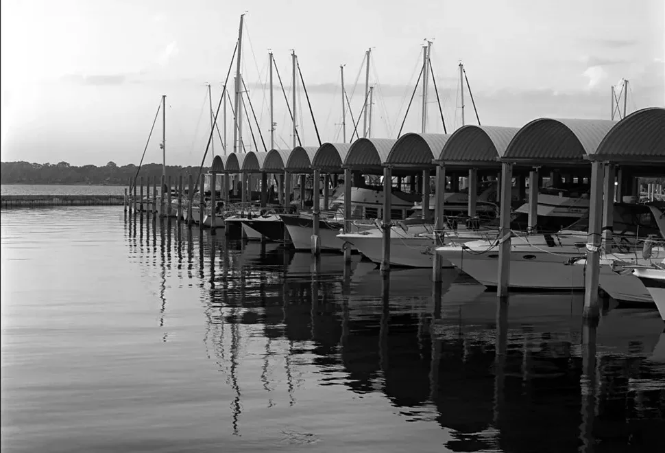 Covered boat slips at the Downtown Panama City Marina. The picture shows the marina before Hurricane Michael, not as it is today.