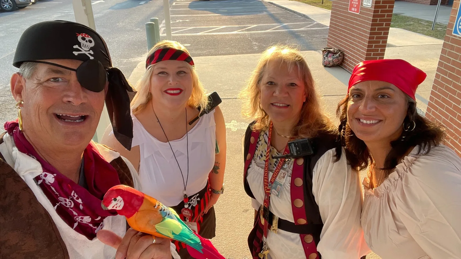 Adults dressed as pirates, the Parker Elementary mascot, in a photo from the school's website.