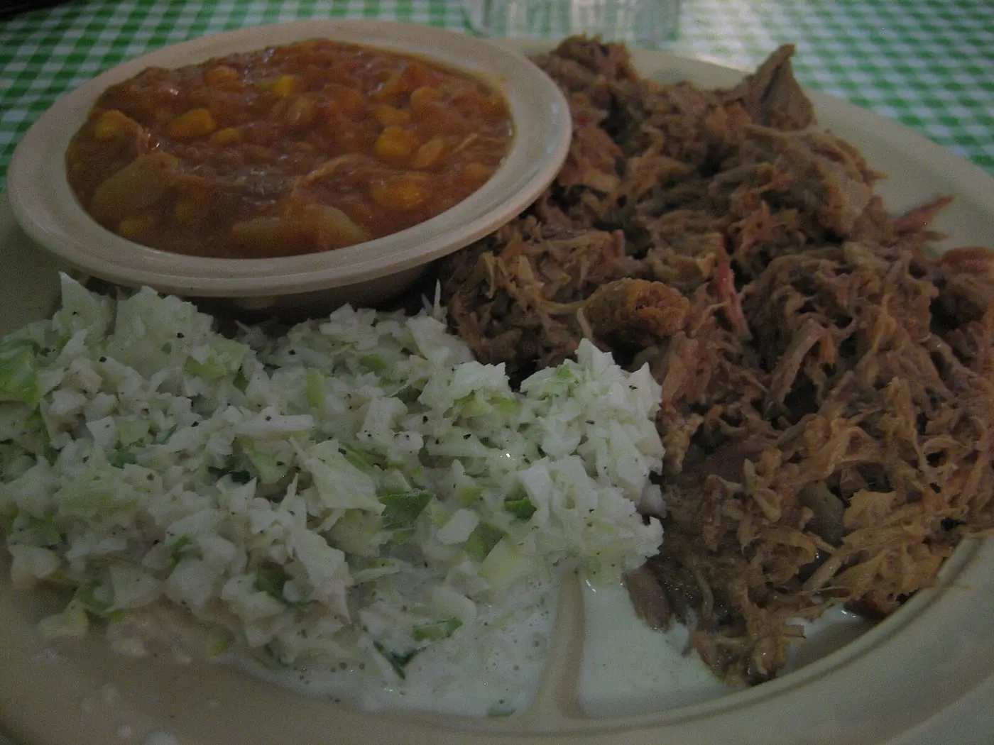 A barbecue plate with pulled pork, coleslaw and Brunswick stew. The photo was not taken at a Panama City restaurant.