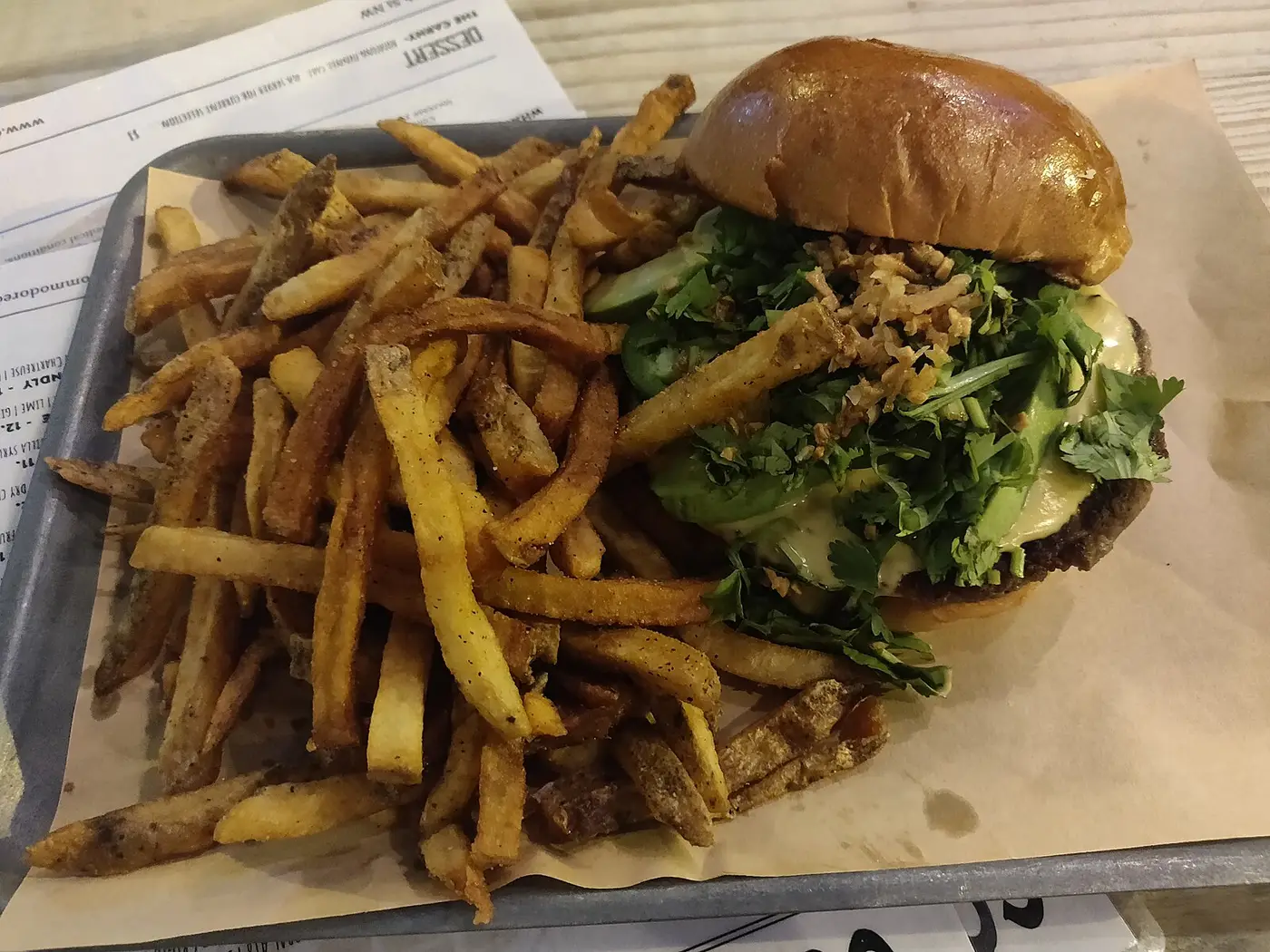 A burger and fries on a tray. The photo was not taken at a Panama City restaurant.